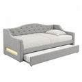 Cama sofá tapizada de poliéster gris con estructura MDF cama auxiliar extraíble y LED 215 x 105 x 100 cm